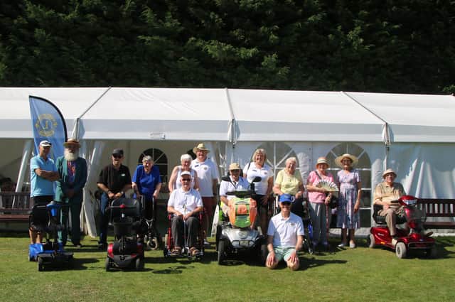 Each year the Pocklington Lions Club has held a tea party in Burnby Hall Gardens for the scooter users.