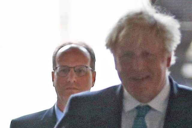 Martin Reynolds and Boris Johnson, pictured in December 2020.