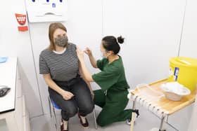 A woman receives a Covid vaccination in Leeds in December.