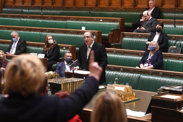 Handout photo issued by UK Parliament of Paymaster General Michael Ellis in the House of Commons, Westminster, answering an urgent question over the lockdown-busting Downing Street drinks party allegedly attended by Boris Johnson and his wife Carrie. Note the empty Tory benches.