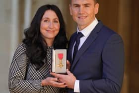 Former rugby league footballer and Motor Neurone Disease fundraiser Kevin Sinfield, with his wife Jayne Sinfield, after he received an OBE during an investiture ceremony at Windsor Castle