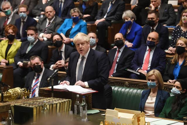 Boris Johnson at Prime Minister's Questions where he apologised for his presence at Downing Street's 'bring your own booze' party during the first lockdown.