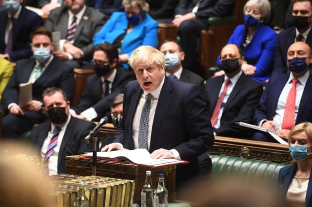 Boris Johnson at Prime Minister's Questions where he apologised for his presence at Downing Street's 'bring your own booze' party during the first lockdown.