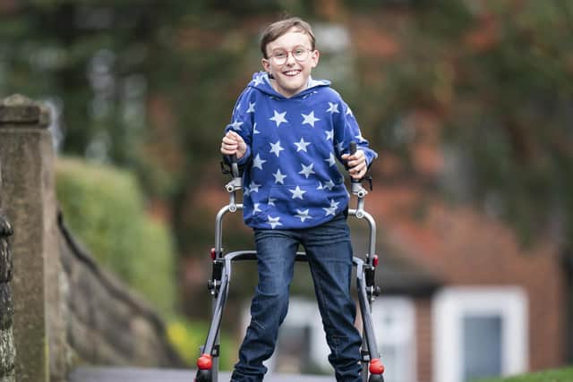 .Eleven-year-old fundrasier Tobias Weller at his home in Sheffield, Yorkshire. "Captain Tobias" has become the youngest person on record to feature on the New Year honours list after he was awarded a British Empire Medal (BEM) for services to charitable fundraising during Covid-19. Picture date: Thursday December 30, 2021. PA Photo. Tobias, who has cerebral palsy and autism, was nicknamed "Captain" after he was inspired by his hero Captain Sir Tom Moore to start raising money during the pandemic lockdowns.