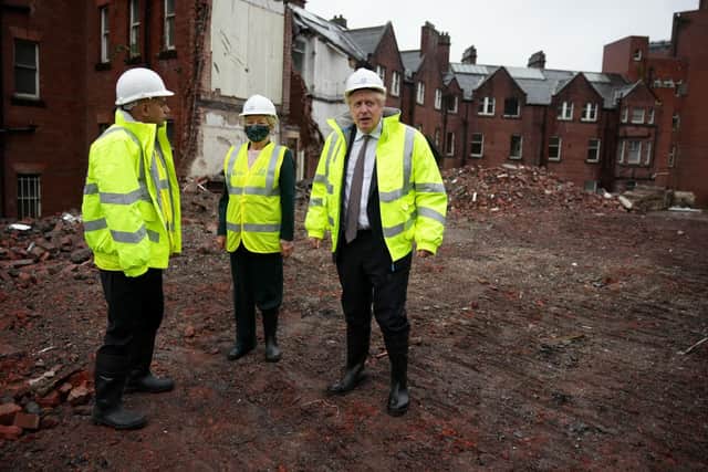 Prime Minister Boris Johnson (right) and Health Secretary Sajid Javid, visit the construction site of the new children's hospital at Leeds General Infirmary in West Yorkshire.