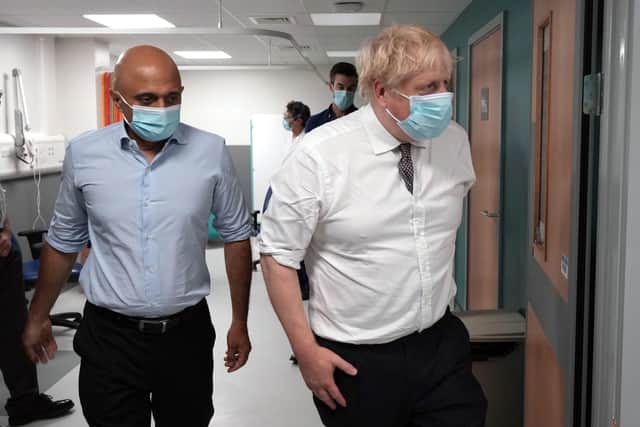 Prime Minister Boris Johnson (right) and Health Secretary Sajid Javid, visit the construction site of the new children's hospital at Leeds General Infirmary in West Yorkshire.