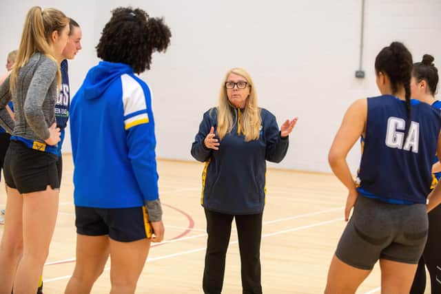 Getting her message across: Tracey Robinson with the Leeds Rhinos Netball players.
