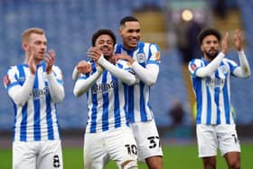 Huddersfield Town's Josh Koroma (left) celebrates with team-mates at Burnley. Picture: PA