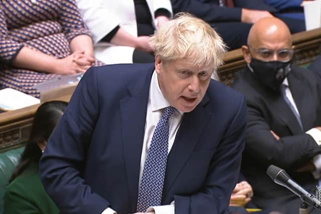 Prime Minister Boris Johnson speaks during speaks during Prime Minister's Questions on Wednesday January 12