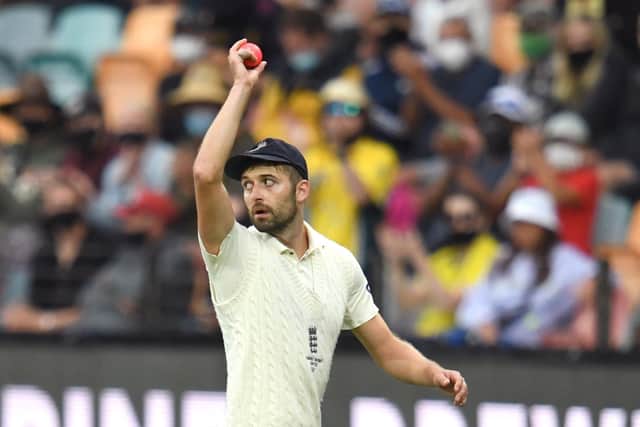 Reward at last: England's Mark Wood leaves the field after taking six wickets during day three of the fifth Ashes Test.