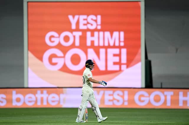 Gone: England's Ollie Pope walks off after being bowled by Australia's Pat Cummins.