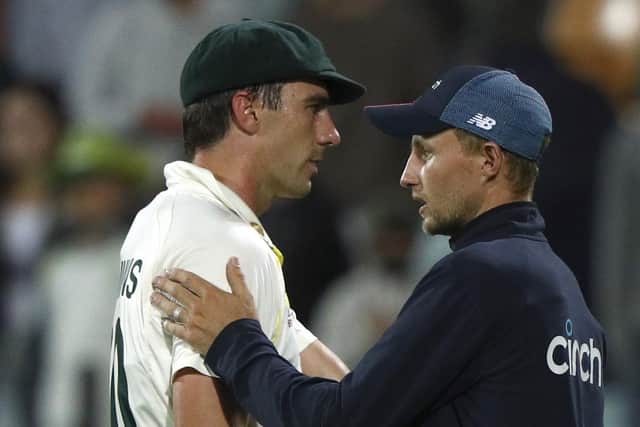 Mutual respect: Australia's captain Pat Cummins, left, shakes hands with England's captain Joe Root after the Hobart Test.  (AP Photo/Tertius Pickard)