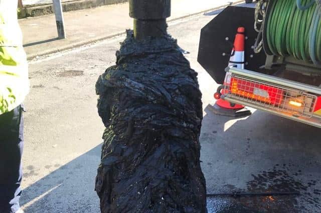 A mass of wet wipes being removed from a Hull sewer  Credit: Yorkshire Water