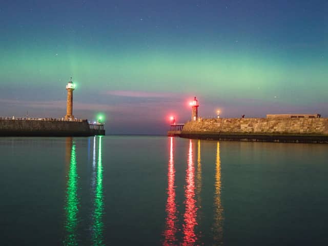 Chris Evans captured this image of the Northern Lights off Whitby, seen here beyond the town's twin piers.