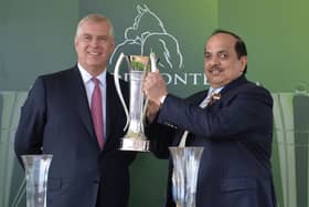 The Duke of York presents the trophy to the owner of Postponed, Sheikh Mohammed Obaid Al Maktoum, after winning the Juddmonte International Stakes during day one of the 2016 Welcome to Yorkshire Ebor Festival at York Racecourse.