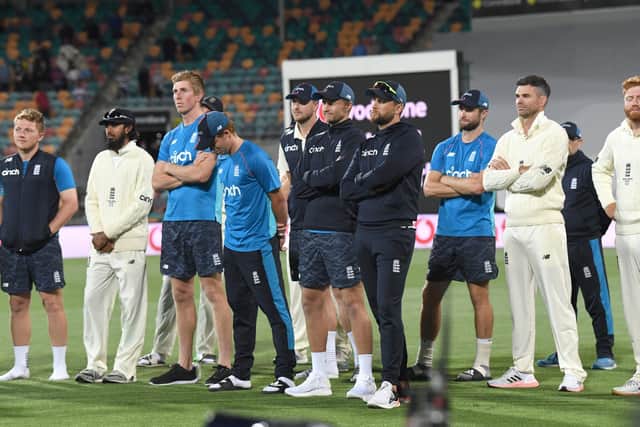 MISERABLE: England's players show their dejection after losing the fifth Ashes Test in Hobart. Picture: Darren England via AAP/PA