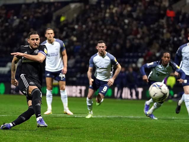 Sheffield United captain Billy Sharp puts the Blades 2-0 up from the spot at Deepdale. Picture: PA