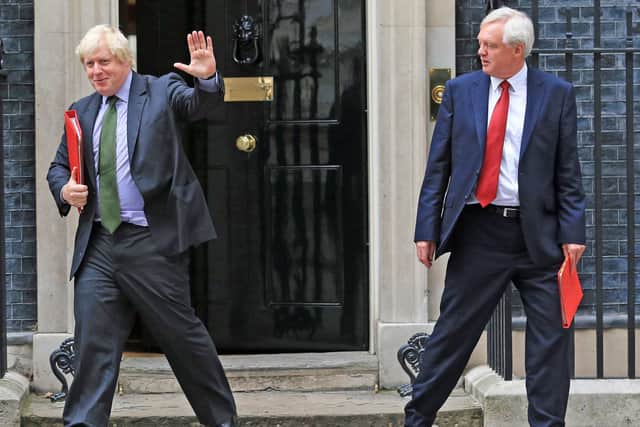 David Davis (right) has turned on his one-time colleague Boris Johnson and told the current PM to resign.