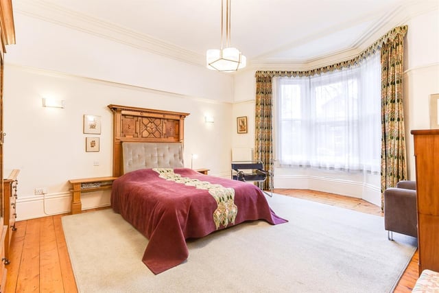 This double bedroom with a bay window is light, bright and spacious.