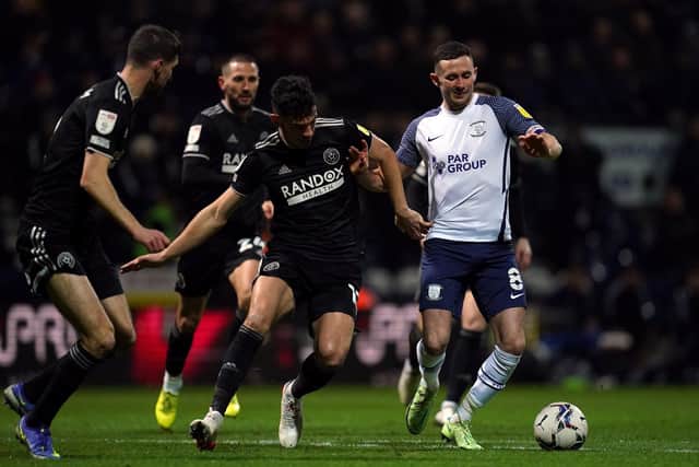 Sheffield United's John Egan and Preston North End's Alan Browne (right) battle for the ball during the Sky Bet Championship match at Deepdale, Preston. (Picture: Nick Potts/PA Wire)