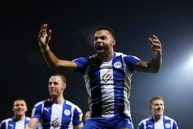 Curtis Tilt, while on loan from Rotherham United, celebrates after scoring Wigan Athletic's third goal during the Sky Bet League One match against Fleetwood Town in November. (Photo by Lewis Storey/Getty Images)