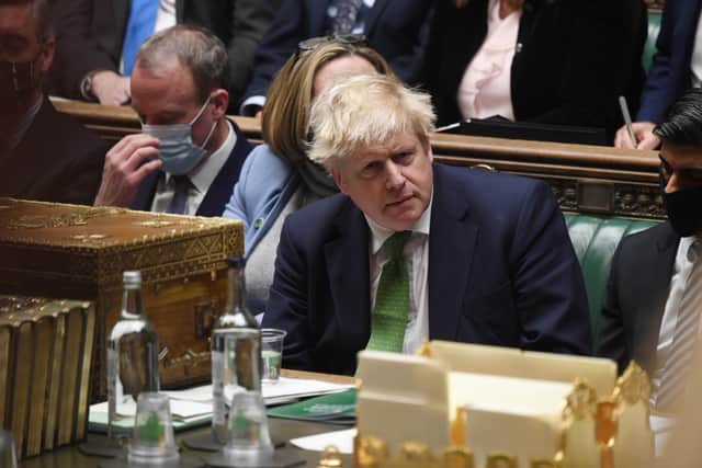 The Prime Minister reacting to David Davis MP during Prime Minister's Questions in the House of Commons.