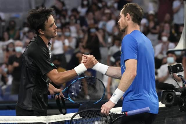 Well played: Taro Daniel, left, is congratulated by Andy Murray  after winning their second round match.