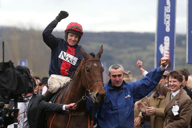 Jockey Barry Geraghty celebrates after winning the Betfred Cheltenham Gold Cup on Bobs Worth in 2013.