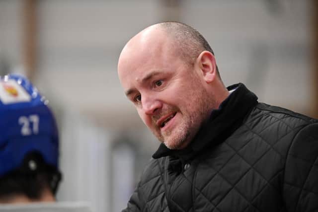 Leeds Knights' coach Ryan Aldridge chats to his players on the bench during Friday night's win over Sheffield Steeldogs
 Picture: Bruce Rollinson