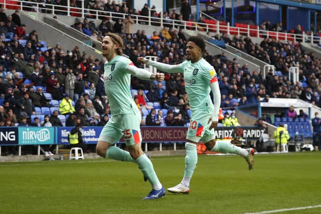 Huddersfield Town's Danny Ward celebrates with Josh Koroma after scoring his second goal of the match against Reading Picture: John Early/Getty Images