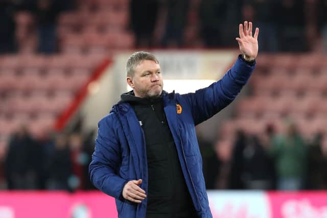 Hull City manager Grant McCann salutes the fans after the final whistle at Bournemouth. Picture: Kieran Cleeves/PA