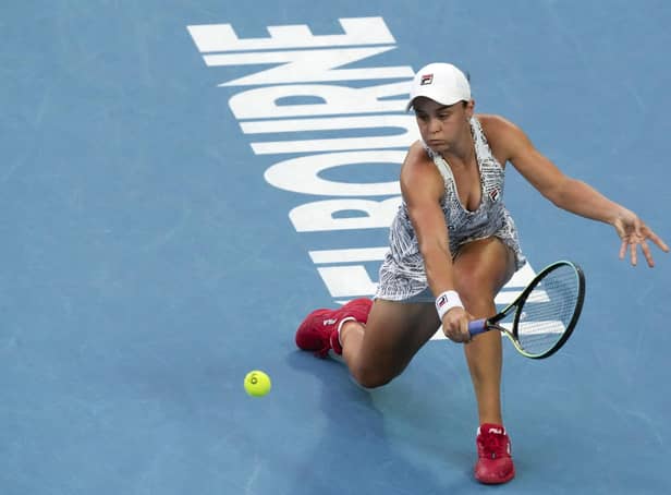 Ashleigh Barty of Australia makes a backhand return to Amanda Anisimova during their fourth round match at the Australian Open Picture: AP Photo/Simon Baker