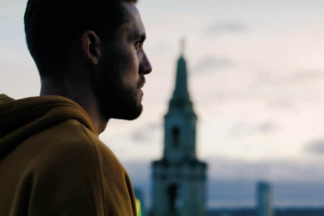 David Nelmes, who is promoting Leeds 2023, looks out over the city's skyline.