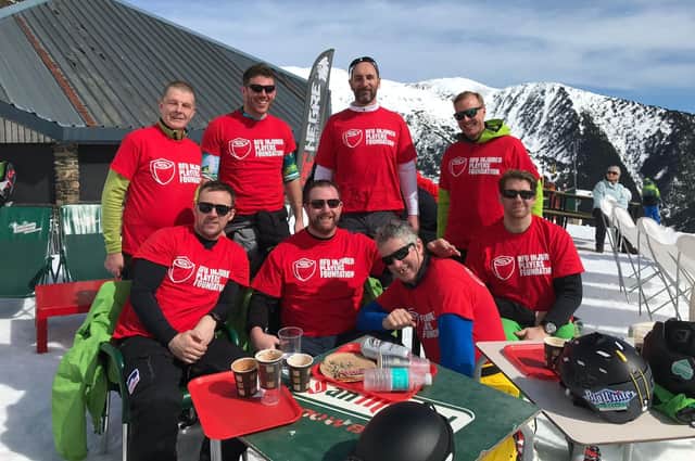 Alex Bennett, second from left front row, has pushed himself to achieve many goals that seemed impossible 10 years ago, including skiing.