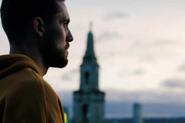 The team behind the Leeds 2023 arts and cultural festival has created a new short film featuring World Champion parkour athlete David Nelmes, who is pictured with the city's skyline behind him. (Photo: Leeds 2023)