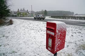 Library image of a  Royal Mail post box. Royal Mail is set to axe around 700 management jobs as part of cost-cutting plans, the company has announced.