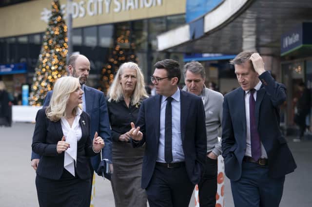 Greater Manchester mayor Andy Burnham and other leaders outside Leeds City Station.