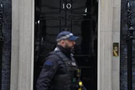 A police officer outside 10 Downing Street, London (PA)