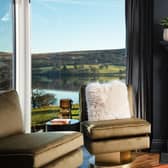 Lynsey's first job was to take out the small corner window with lots of dividers that broke up the view. It was replaced with two, floor-to-ceiling panes of glass that deliver a much bigger, uninterrupted vista of the lake and the fells beyond.