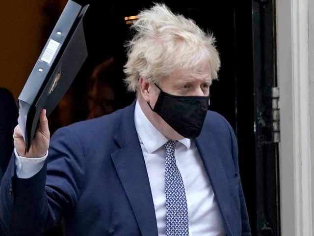 Prime Minister Boris Johnson leaves 10 Downing Street to make a statement in the House of Commons, Westminster, after it was announced that Scotland Yard has launched an investigation into a "number of events" in Downing Street and Whitehall in relation to potential beaches of coronavirus laws (PA)
