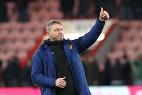 Hull City manager Grant McCann salutes the fans after the final whistle after winning at Bournemouth. Picture: Kieran Cleeves/PA