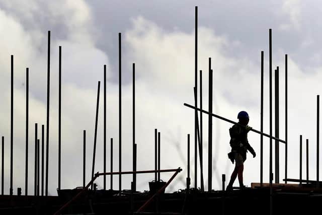 Construction firms are being targeted by cyber criminals with fake invoices and bank details as part of a sophisticated fraud netting more than £100m a year in the UK. Picture: Gareth Fuller/PA Wire