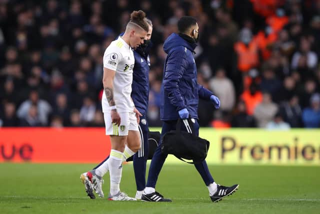 Leeds United's Kalvin Phillips leaves the pitch after receiving medical treatment. (Photo by George Wood/Getty Images)
