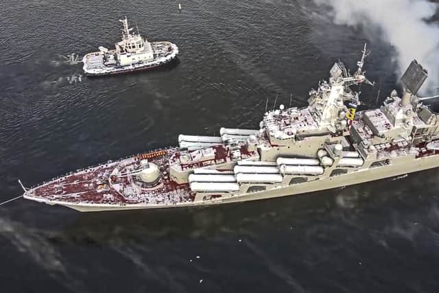 In this photo taken from video and released by the Russian Defense Ministry Press Service on Wednesday, Jan. 26, 2022, The Russian navy's missile cruiser Marshal Ustinov sails off for an exercise in the Arctic. Russia has launched a series of drills amid the tensions over Ukraine and deployed an estimated 100,000 troops near the Ukrainian territory that fuelled Western fears of an invasion.