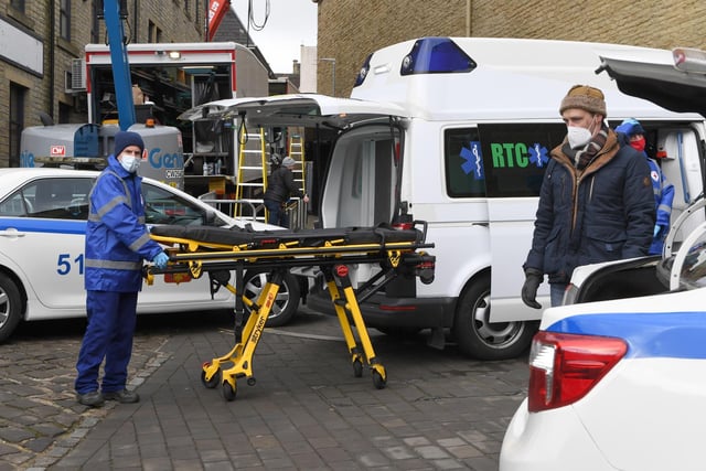 Some of the vehicles being used for the filming of Secret Invasion outside The Piece Hall today. Photo by Getty Images.