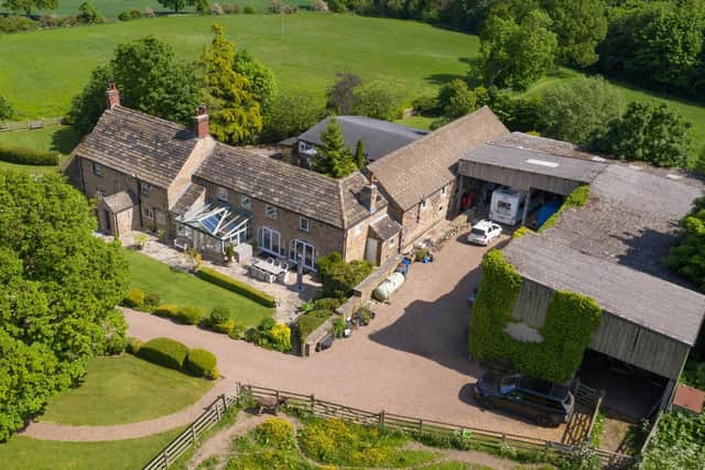 An overview of the fabulous property for sale off Huddersfield Road, Barnsley: This three-bedroom farmhouse with three-bedroom annexe has a leisure suite, stables, barns and 21 acres. £1.675m, www.fineandcountry.com