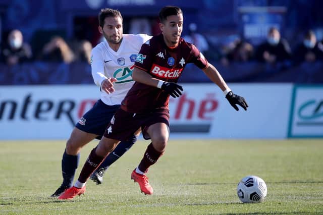 PRIMARY TARGET: Metz midfielder Amine Bassi, right, in action against Bergerac-Perigord in December. Picture: ROMAIN PERROCHEAU/AFP via Getty Images