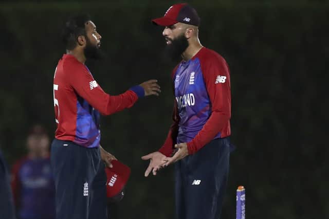 Spin twins: England stand-in captain Moeen Ali, right, has hailed the value of team-mate and friend Adil Rashid in the T20 side. (AP Photo/Aijaz Rahi)