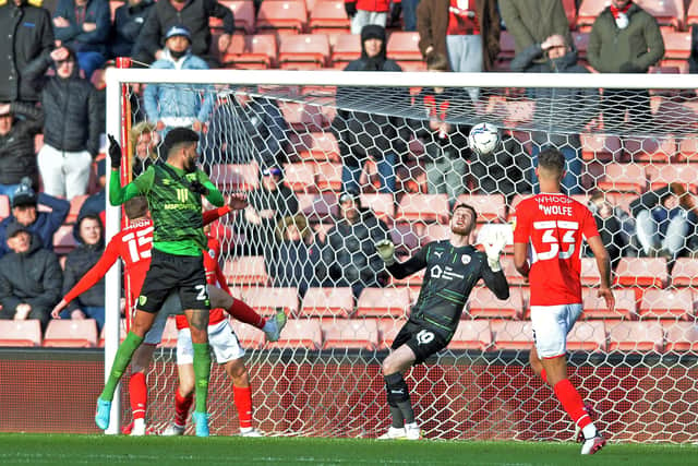 Philip Billing heads in Bournemouths opening goal against 
Barnsley (
Picture: Bruce Rollinson)