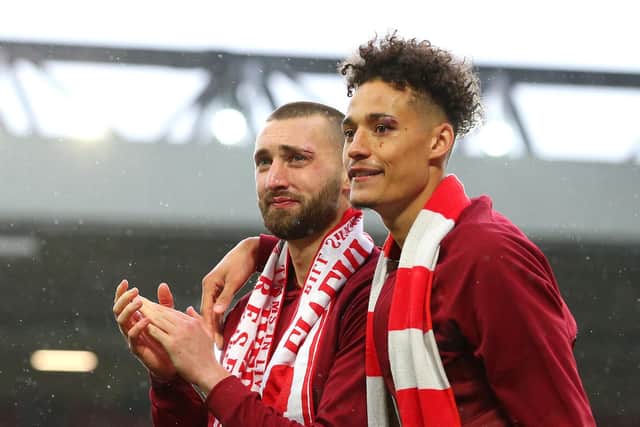 LINKED: Nat Phillips, left, and Rhys Williams, right, have already been linked with a move to Bramall Lane. Picture: Getty Images.